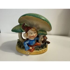 Pixie Elf Sitting Under a Mushroom in a Mushroom Garden Planter